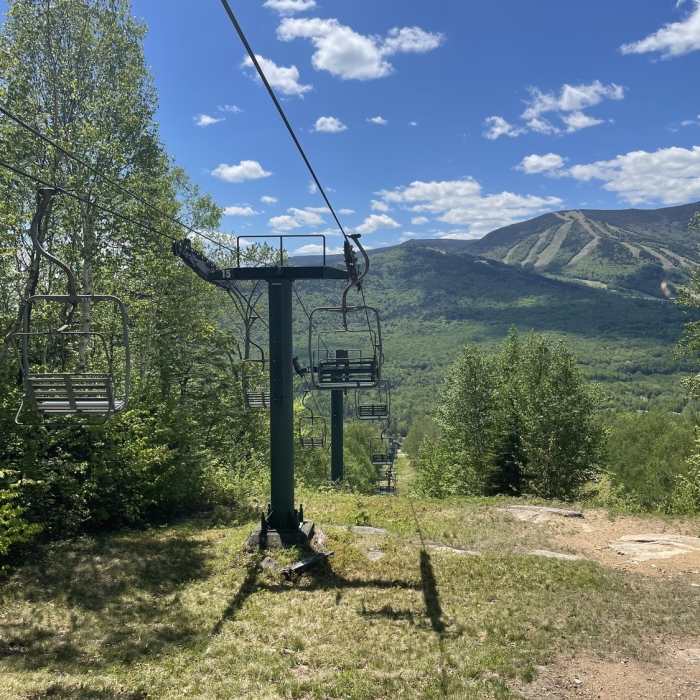 Chairlift and lookout over Waterville Valley. Near Snow's Mountain Lower Loop