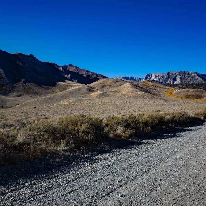 Laurel Lakes Road can be seen winding up the hillside as viewed from Sherwin Creek Road. Near Laurel Lakes Road #4S86