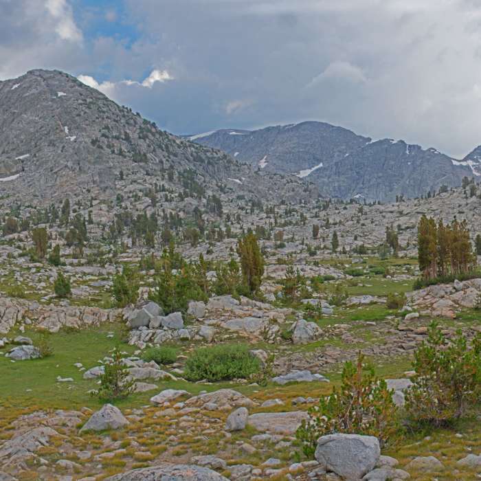 Valley on route to Three Island Lake, with sound of 500 foot cascade (not visible) and surrounded on 3 sides by granite peaks. Near Sandpiper Lake Trail