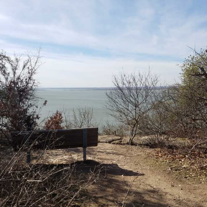 Beyond the bench are several rock ledges that offer good seating and better views of one of the prettiest lakes in North Texas. Near Northwest Ridge Loop