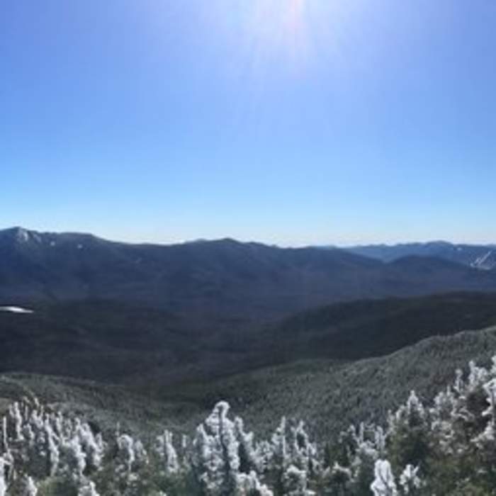 Panoramic view from the ledge on North Kinsman. Near South Kinsman Mountain via Basin-Cascades and Kinsman Pond Trails