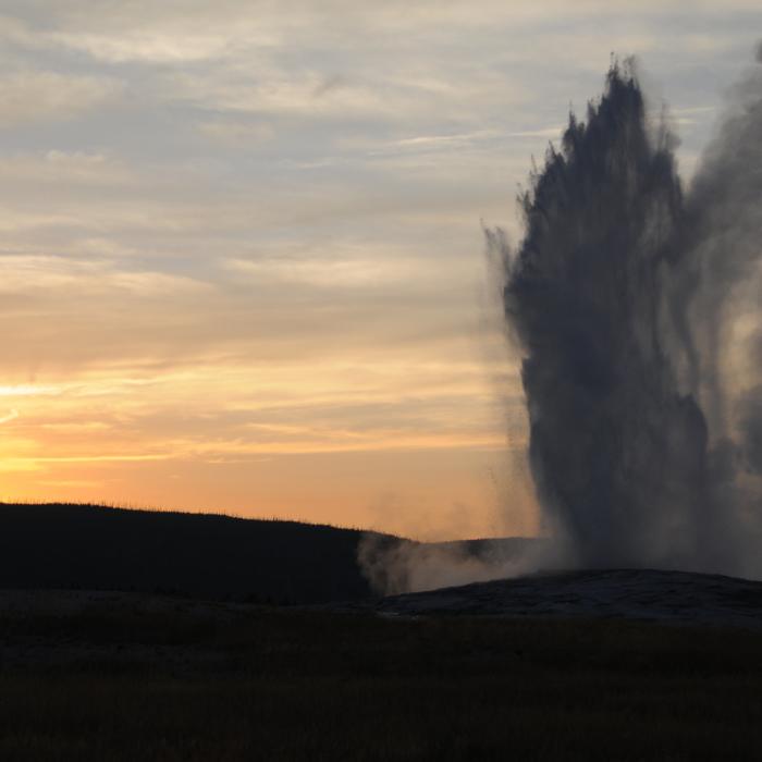 Old Faithful at Sunset Near Observation Point-Geyser Hill