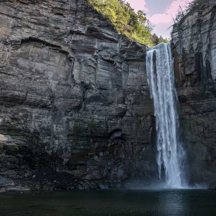 Taughannock Falls plummets over the sheer cliffside. Near Taughannock Falls via Gorge Trail