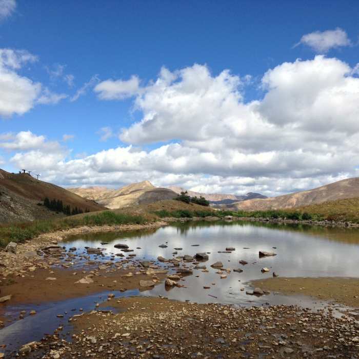 Lake Reveal, hidden by snow all winter, is beautiful in the summer. Near Half Moon Trail