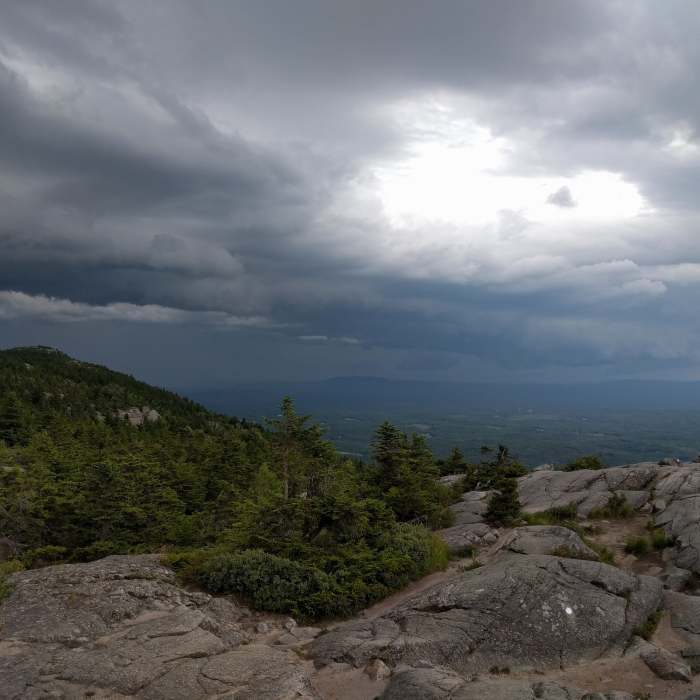 Storm clouds rolling in from the north at Three Quarters Ledge on the White Dot Trail. Near Monadnock White Cross/Dot Loop