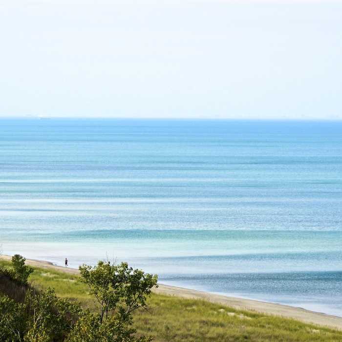 A lone jogger on the beach. Near Trail 9