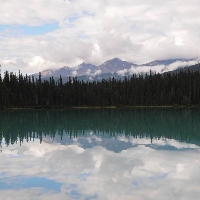Mount King stands prominently behind Emerald Lake. Near Emerald Lake Trail