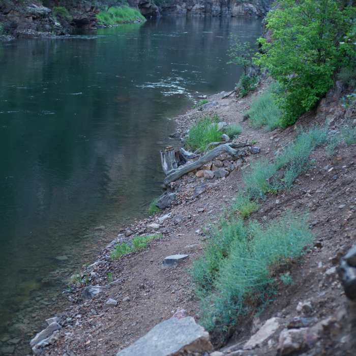 The trial ends at the riverside where you can enjoy putting your feet in the water and enjoying a break from the heat. Near Mesa Creek Trail