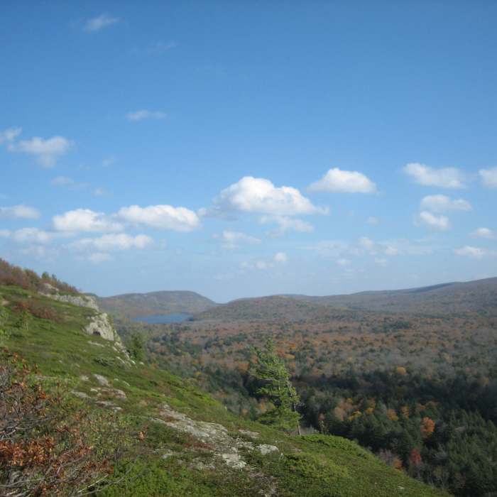 Escarpment Ridge with Lake of the Clouds in the distance. Near Porcupine Mountains Traverse