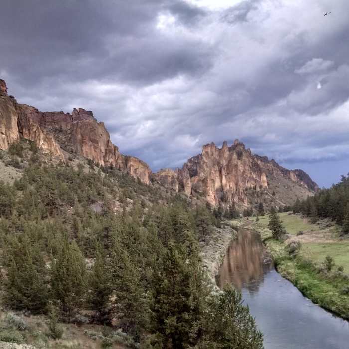Looking at the back side of Monkey Face pinnacle and Smith Rock Group just before a thunderstorm. Near Misery Ridge Loop