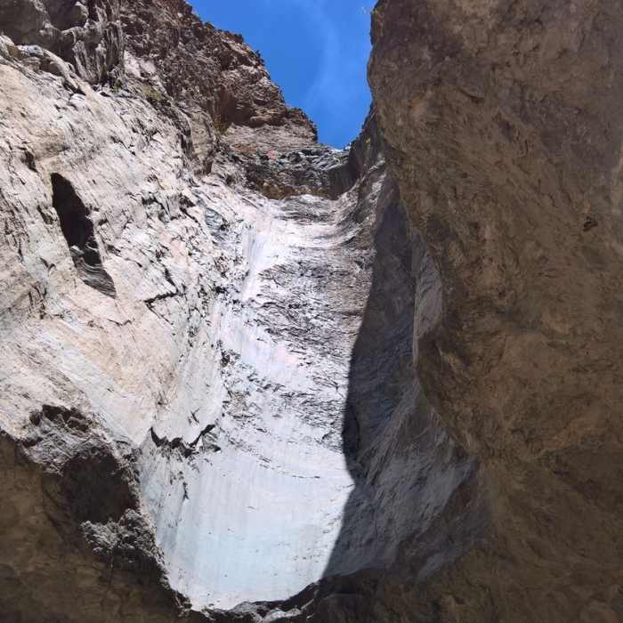 Lower Burro Mesa Pour-off towers overhead at the end of the trail. Near Upper Burro Mesa Pour-Off Trail