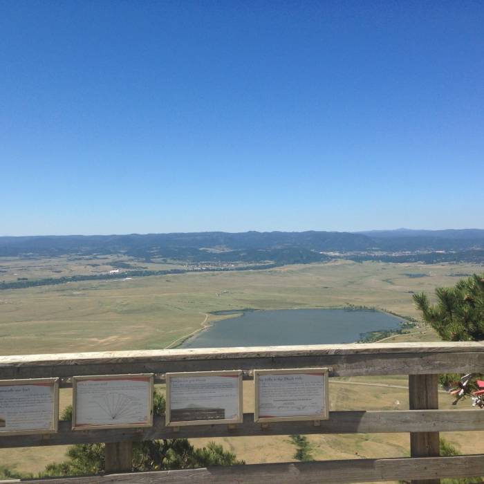 View of the town of Sturgis and the northern Black Hills from the viewing platform ~1000ft above the plains. Near Summit Trail