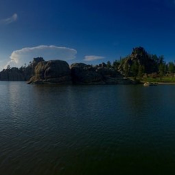 Panorama of Sylvan lake. One of the most beautiful lakes I have ever seen. If you are near Mount Rushmore take the time to drive up here and check it out. There is a nice trail that goes around the lake. Near Sylvan Lake Shore Trail