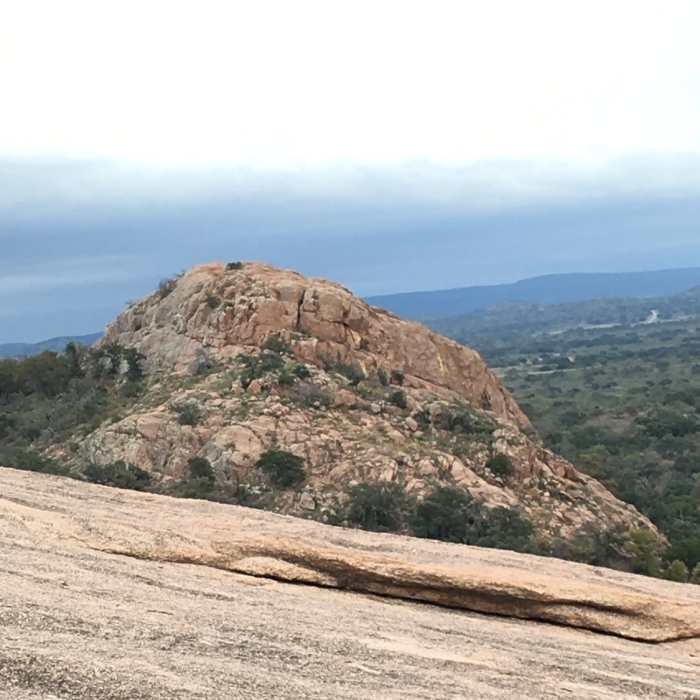 Hiking up the Summit Trail offers fantastic views of Enchanted Rock. Near Interpretive Loop