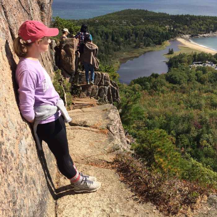 Enjoying the stunning view from one of the narrower ledges of the Beehive Trail. Near Beehive Trail