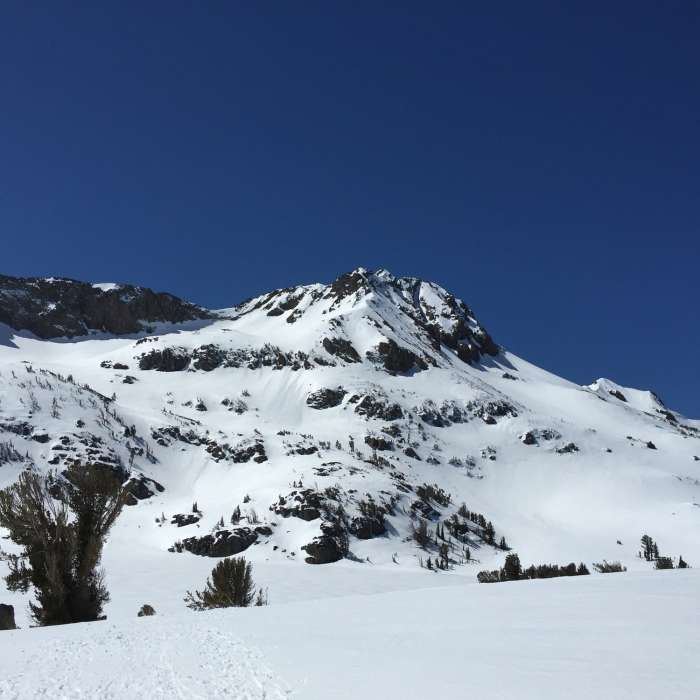 Destination Round Top etched and Lake Winnecucca covered by April's snow. Near Winnemucca Lake and Elephant's Back