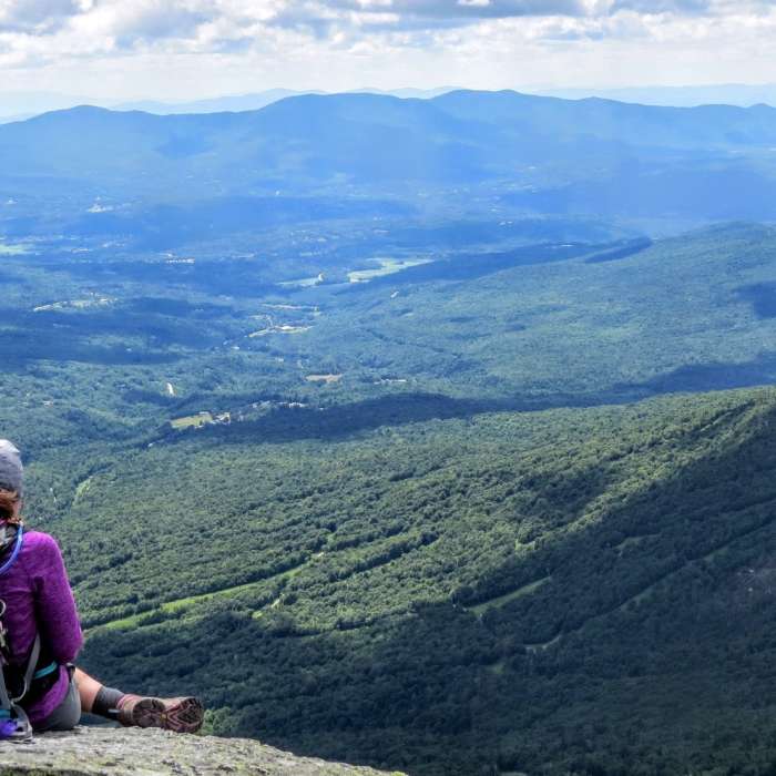 Peaceful and content after a day's hiking, you're sure to enjoy the view from "The Chin" looking down on Stowe. Near Sunset Ridge Out-and-Back