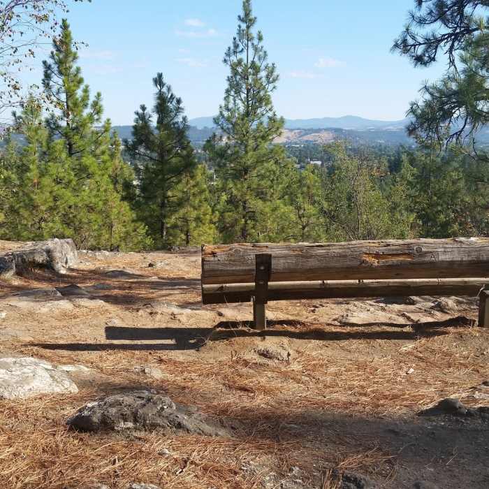 On the Nimbus Knob Trail, there's a bench for sitting and enjoying the view. Near Pinecliff Loop