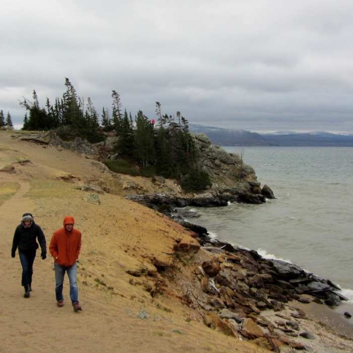 Hikers bundle up as they leave Storm Point on a stormy September afternoon. Near Storm Point