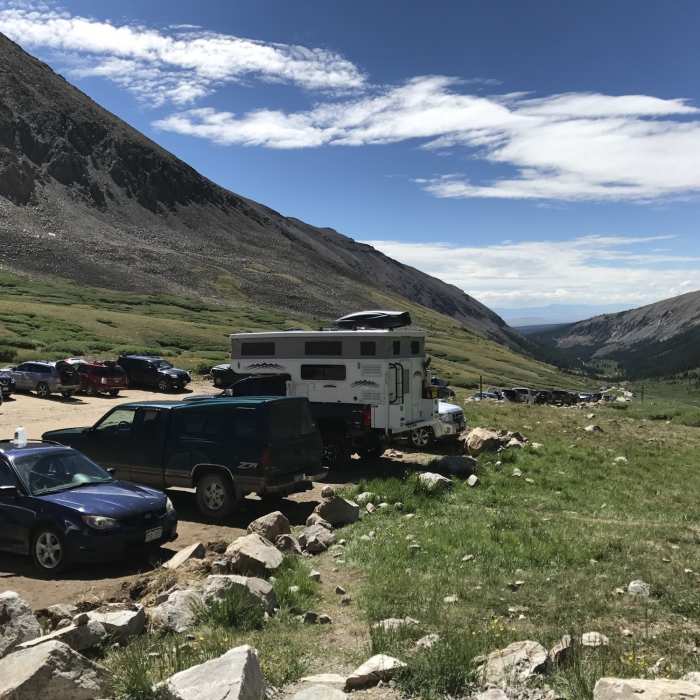 Expect a full parking lot and cars parked along both sides of the road for at least 100 yards. Near Mount Bross - West Slopes