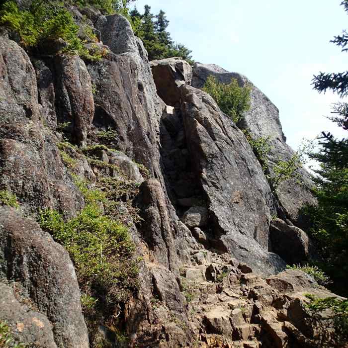 Trail goes through this crack. Known as the Chimney. Near Catamount Mountain Trail