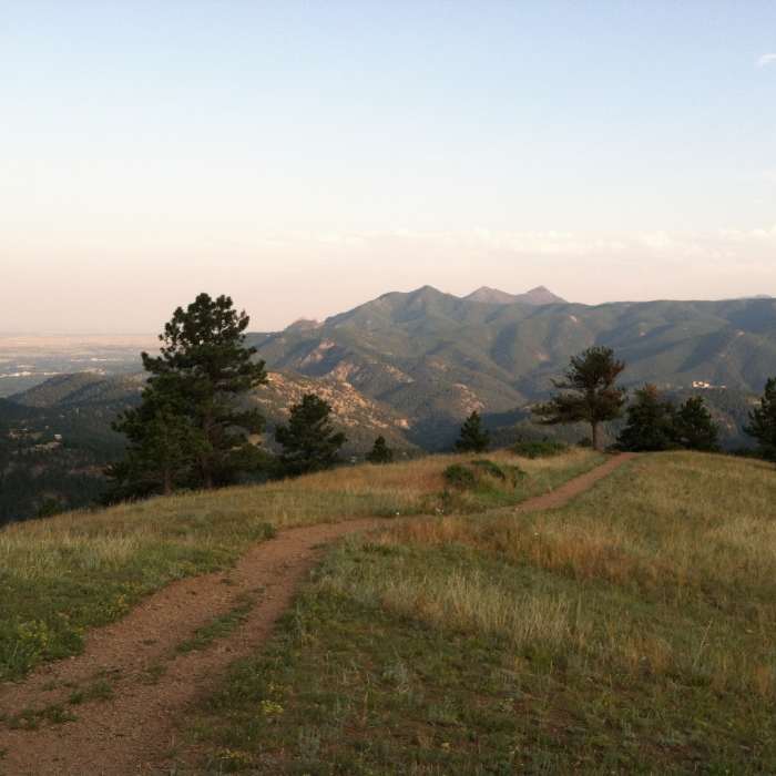 View from summit showing Boulder and the backside of the Flatirons. Near Pines to Peak Loop