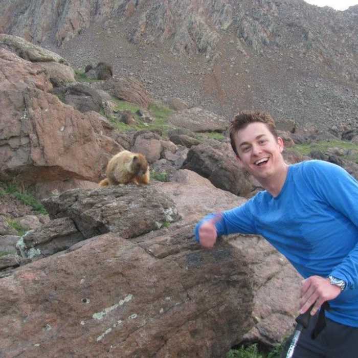 Somebody's been feeding this guy! A curious marmot in the basin below Wetterhorn. Near Wetterhorn Peak