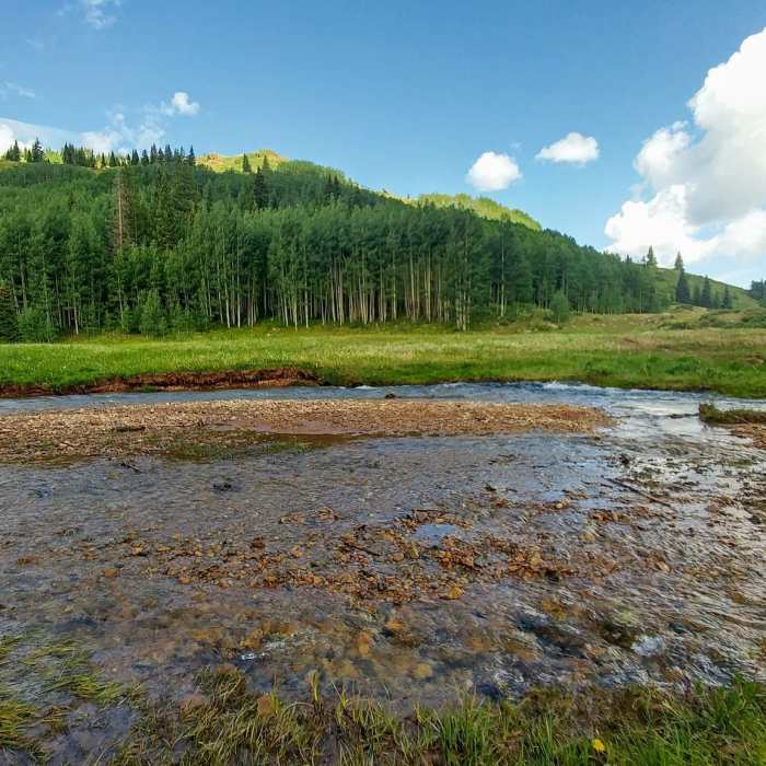 Capitol Creek intersecting Capitol Ditch (Upper) Trail as it meets with Capitol Creek Trail. Must walk through this icy creek to pass. Near Capitol Creek