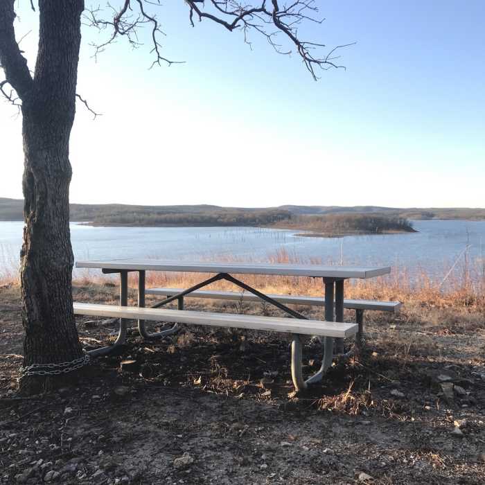 Picnic table by lake on orange trail about 1.5 miles from trailhead; great place to relax Near Berry Bend East