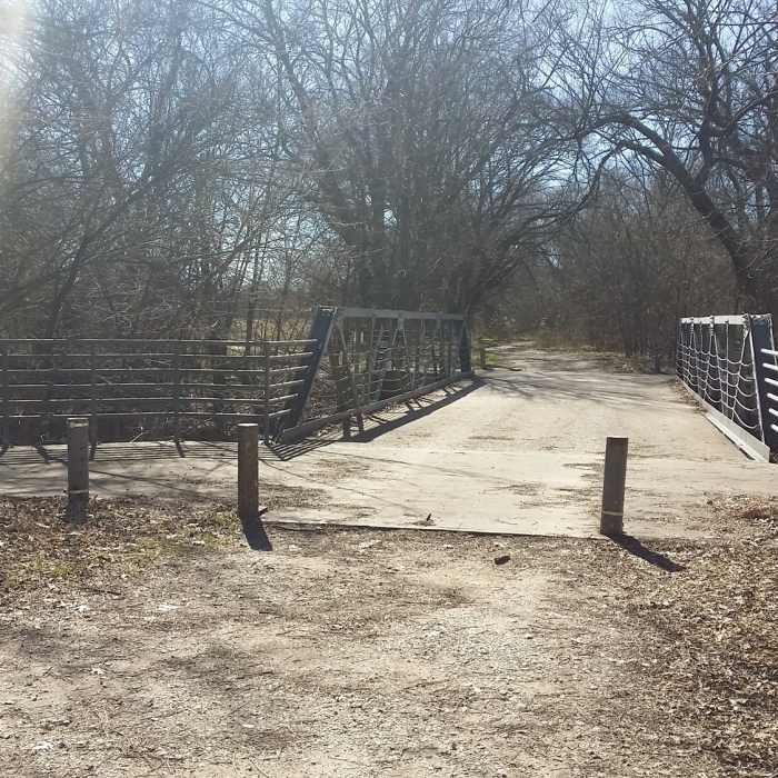 Cross this bridge just before the entrance to the meadow. Near Connemara Meadow Nature Preserve