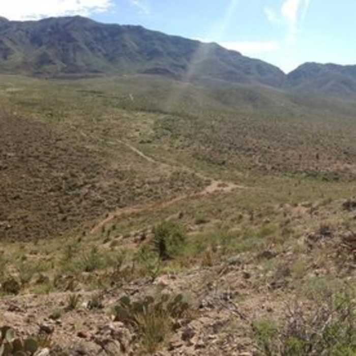 A view from the top of La Espina Hill east towards the Franklin Mountains. The Suicide Drop is to the left, La Espina is to the right. Mayberry, Broke Back, Little Moab West and even Transmountain Summit are all visible in the distance. It's hard to capture the variety of the foothills here. Near Granola Bowl