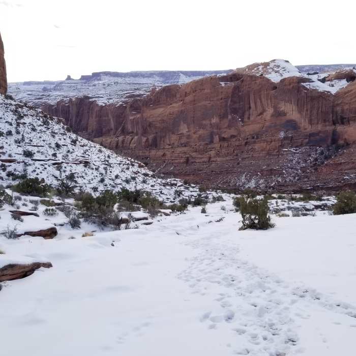 The steep anticline can get tricky if snowfalls. Hiking poles would help, regardless of season Near Moab Rim Trail