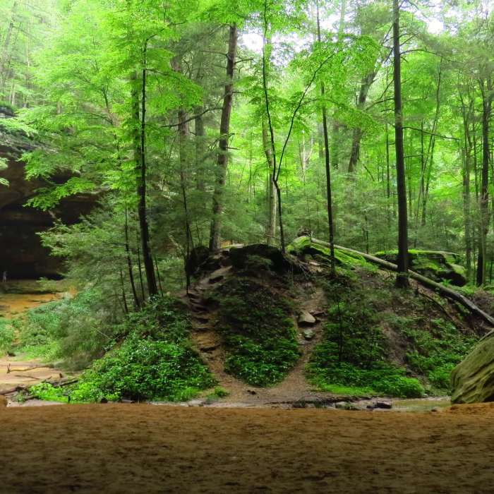 Ash Cave with waterfall after the rain. An easy hike in the Hocking Hills along the lovely Ash Cave Gorge Trail. Near Ash Cave Gorge Trail