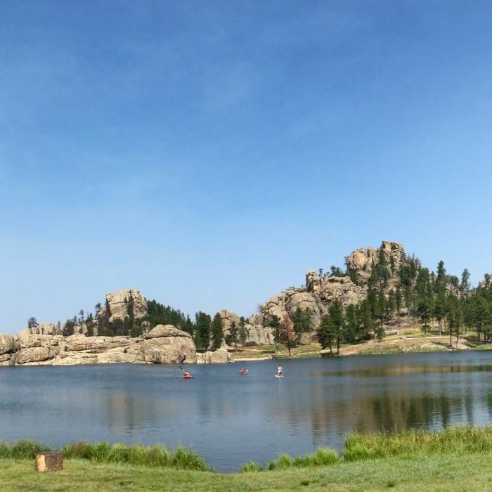 Sylvan Lake is made beautiful on a sunny summer day. Near Sylvan Lake Shore Trail