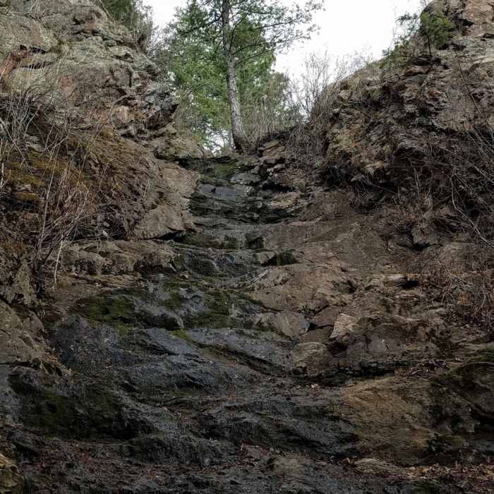 Waterfall leaking down rocks Near Intemann Trail