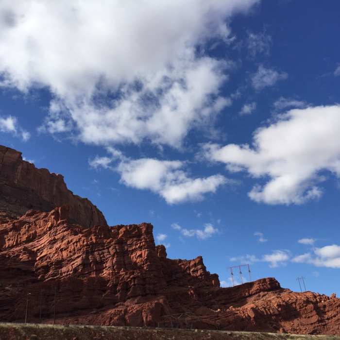 It starts to get real when you see Red Rocks. Near Moab Canyon Paved Path