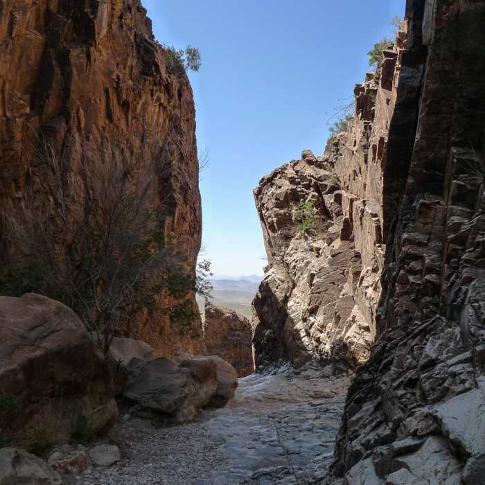 View of the Window. Be careful at the edge, it's a long drop to the bottom of the Chisos Basin! Near Window Trail