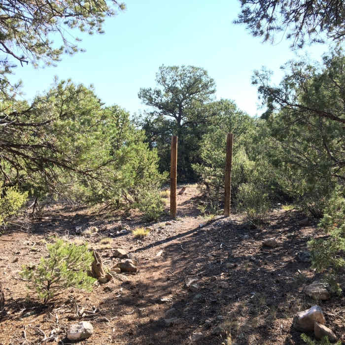 Style or gateway. Turn right to a slight climb. Near Las Vistas de Questa Trail
