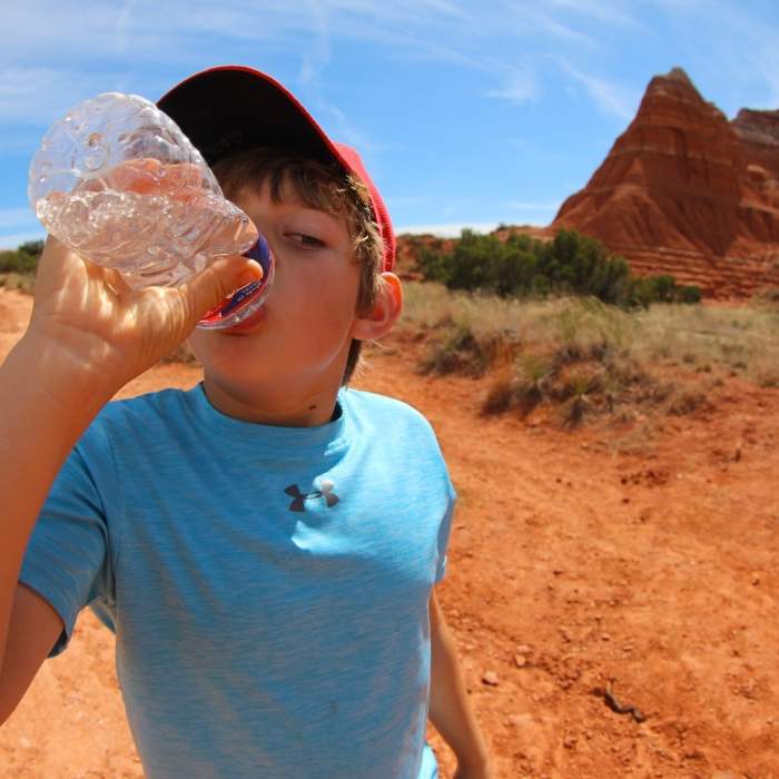 A parched Gabriel quenches his thirst on the Lighthouse Trail. Near Lighthouse Trail
