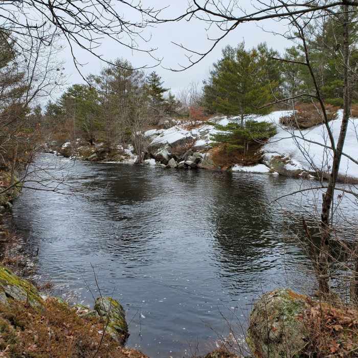 Upriver of the rapids in winter. Near Depot Lake Loop