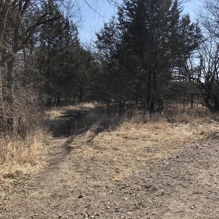 This entrance to the Pawnee Prairie Park trails is for hiking only, no bicycles. Near Prairie Sunset Trail