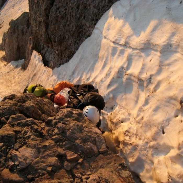 Class 3 move. Snowy scrambling just below the summit of Broken Hand Pass, July 2011. Near Crestone Needle South Face