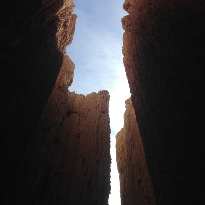 A view from inside one of the slot canyons into the sky above Near Miller Point Caves Loop