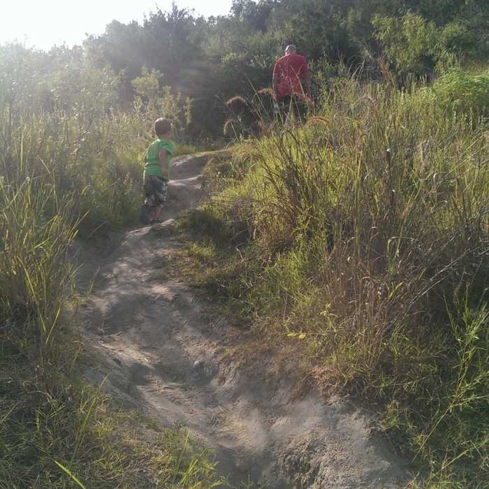 Hike up to the camp grounds from the river, possibly on an outlaw trail (as there are many) Near Swimming Area Trail
