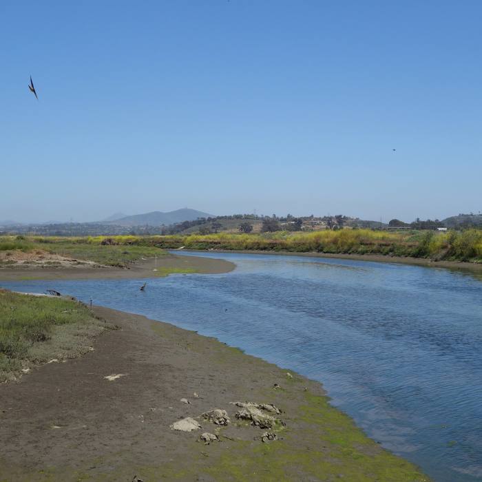 San Dieguito River flowing through he San Dieguito Lagoon with Black Mountain visible 7 miles away. Near Coast to Crest Trail: San Dieguito Lagoon