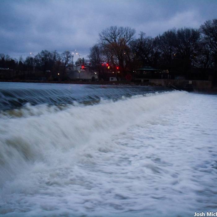 Surging water along the Fox River Trail. Near Fox River Trail