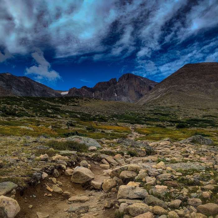 Approximately the halfway mark to Chasm Lake, above alpine now and the first clear view of Longs Peak (Mount Lady Washington, right). Near Jims Grove Trail