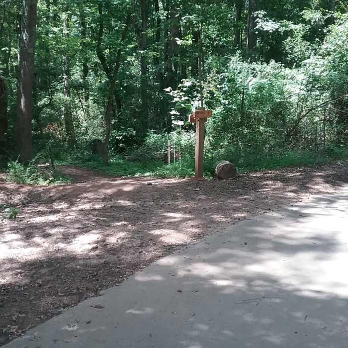 Left off of Sparkleberry Connector down onto Box Turtle Run. Near The Big Lefty