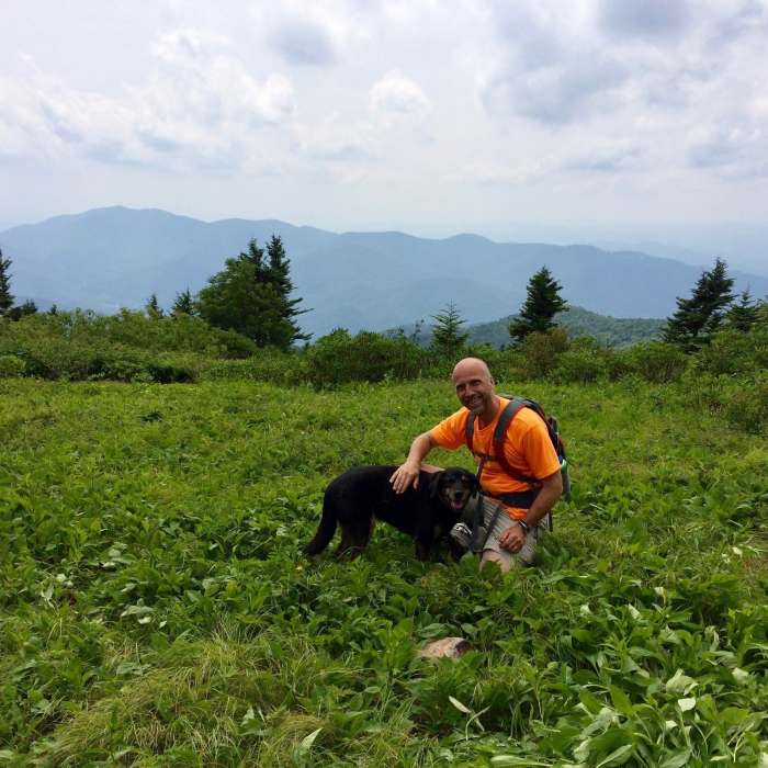 This is the meadow at the top. And this is Bodhi. He is not our dog; he was a dog from the neighborhood who led us up the trail. At one point he surprised us at the other end of a crawl through space. Near Woody Ridge Trail (177)