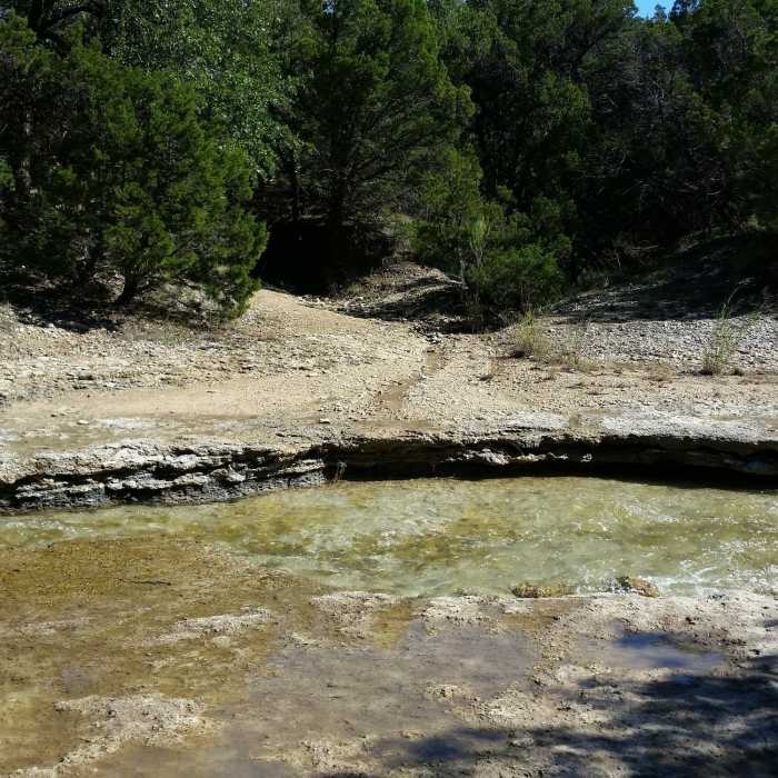 Beginning of the spillway trail -- get a good running start! Near Spillway Hiking Trail